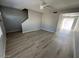 Open-concept living room showcasing new floors and bright, neutral walls at 3840 N 43Rd Ave # 71, Phoenix, AZ 85031