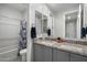 Well-appointed bathroom with double vanity, bathtub, and modern fixtures at 3855 S Mcqueen Rd # 101, Chandler, AZ 85286