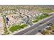 Aerial view of a vibrant community with well-maintained homes and green spaces at 3855 S Mcqueen Rd # 101, Chandler, AZ 85286