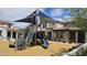 Community playground area with modern play structure and nearby townhome buildings at 3855 S Mcqueen Rd # 101, Chandler, AZ 85286