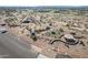 Aerial view of the community playground featuring multiple play structures, picnic areas, and shade covers at 3855 S Mcqueen Rd # 101, Chandler, AZ 85286