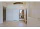 Bright foyer with tile flooring, showcasing high ceilings and an open doorway leading to outdoor views at 3928 N 151St Ave, Goodyear, AZ 85395