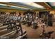 Well-equipped gym featuring modern treadmills and weight machines for a complete fitness experience at 3928 N 151St Ave, Goodyear, AZ 85395