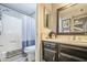 Charming bathroom featuring a vanity, shower, and an adjacent toilet at 4112 E Maldonado Dr, Phoenix, AZ 85042