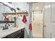 Updated bathroom with a vanity, mirror, and a shower with a glass door at 4112 E Maldonado Dr, Phoenix, AZ 85042