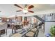 Dining area with table, stairs, kitchen, cabinets and a floral decoration in a vase at 4112 E Maldonado Dr, Phoenix, AZ 85042
