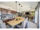 Bright kitchen with granite countertops, seating at the island, and stylish decor at 4112 E Maldonado Dr, Phoenix, AZ 85042