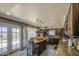 Bright eat-in kitchen with stainless appliances, center island and bar stool seating at 4112 E Maldonado Dr, Phoenix, AZ 85042