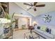 Open-concept living area features vaulted ceilings, stylish decor, and seamless transition to other living spaces at 4112 E Maldonado Dr, Phoenix, AZ 85042
