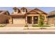 Charming single-Gathering home with a two-car garage, lovely landscaping, and a welcoming front porch at 4320 E Bernice St, Gilbert, AZ 85295