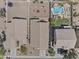 Aerial view of the property, highlighting the layout of the house, desert landscaping and pool at 44284 W Buckhorn Trl, Maricopa, AZ 85138