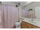 This bathroom features a sink, mirror, toilet, and a shower at 44284 W Buckhorn Trl, Maricopa, AZ 85138