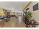 Spacious living room featuring tile flooring, neutral walls, and elegant decor at 44284 W Buckhorn Trl, Maricopa, AZ 85138
