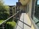 Outdoor balcony with view of the green lawn and apartments at 461 W Holmes Ave # 336, Mesa, AZ 85210