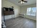Bedroom including desk and piano next to natural light from window at 461 W Holmes Ave # 336, Mesa, AZ 85210