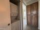 Laundry closet including washer/dryer combo and built in storage cabinets at 461 W Holmes Ave # 336, Mesa, AZ 85210
