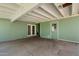 Enclosed patio perfect for gatherings or relaxation with a green painted brick wall at 4744 W Altadena Ave, Glendale, AZ 85304