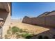 Spacious backyard featuring a block fence and potential for landscaping at 47859 W Moeller Rd, Maricopa, AZ 85139