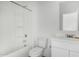 White bathroom with tub-shower combo, white toilet, and vanity at 47859 W Moeller Rd, Maricopa, AZ 85139