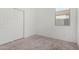 Neutral bedroom with carpet and a closet offers plenty of space at 47859 W Moeller Rd, Maricopa, AZ 85139
