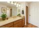 Updated bathroom featuring neutral countertops, tiled floors, and a bright mirror at 5102 N 31St Pl # 436, Phoenix, AZ 85016