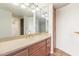 Bathroom features a vanity, tiled floor and a large mirror at 5102 N 31St Pl # 436, Phoenix, AZ 85016