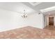 Bright dining room with terracotta tile flooring, chandelier, and plenty of natural light at 5102 N 31St Pl # 436, Phoenix, AZ 85016