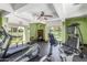 Brightly lit exercise room featuring machines, free weights, and a view of the green outdoors at 5102 N 31St Pl # 436, Phoenix, AZ 85016