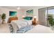 Cozy main bedroom with stylish decor, comfortable bed, and outdoor access at 5102 N 31St Pl # 436, Phoenix, AZ 85016
