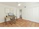 Bright office with tile flooring, closet, desk with computer, and neutral decor at 5102 N 31St Pl # 436, Phoenix, AZ 85016