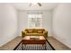 Inviting living room with stylish sofa and window at 531 S 198Th Ave, Buckeye, AZ 85326