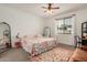 Cozy main bedroom features a comfortable bed, ample natural light and stylish decor at 531 S 198Th Ave, Buckeye, AZ 85326