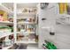 Pantry offers ample storage with well-organized shelving and various food items at 531 S 198Th Ave, Buckeye, AZ 85326