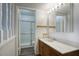 Functional bathroom with a shower and vanity, enhanced by modern fixtures at 5807 W Acoma Dr, Glendale, AZ 85306