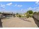 Inviting backyard with a pool, rock landscaping, and a spacious patio, perfect for outdoor enjoyment at 6027 E Spring Rd, Scottsdale, AZ 85254