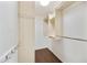 Organized walk-in closet with custom shelving and storage for efficient organization at 6027 E Spring Rd, Scottsdale, AZ 85254