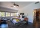 Bright main bedroom featuring large windows, stylish decor, and a cozy atmosphere at 712 W Vernon Ave, Phoenix, AZ 85007