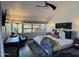 Cozy bedroom with a comfortable bed, soft rug, and large windows for natural light at 712 W Vernon Ave, Phoenix, AZ 85007