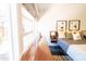 Comfortable bedroom features a large window, modern decor, and ample natural light at 712 W Vernon Ave, Phoenix, AZ 85007