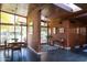 Stylish dining room with wood accents, brick walls, and plenty of natural light at 712 W Vernon Ave, Phoenix, AZ 85007