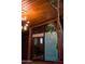 Stylish front entrance with a blue door, unique exterior lighting, and a well-maintained facade at 712 W Vernon Ave, Phoenix, AZ 85007