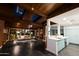 Open floor plan combining living area with skylights, modern kitchen, and seamless indoor-outdoor living at 712 W Vernon Ave, Phoenix, AZ 85007