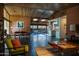 Expansive living space boasting skylights, brick walls, and an open floor plan perfect for entertaining at 712 W Vernon Ave, Phoenix, AZ 85007