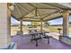 Covered park pavilion with picnic tables and BBQ grill, perfect for outdoor gatherings at 7332 W Pershing Ave, Peoria, AZ 85381