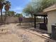 Backyard featuring desert landscaping, a covered patio and a hot tub at 7415 S 16Th S Dr, Phoenix, AZ 85041
