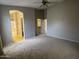 Bedroom with doors to bathroom and walk in closet at 7415 S 16Th S Dr, Phoenix, AZ 85041