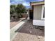 Charming single-Gathering house featuring a walkway leading to the front door, surrounded by desert landscaping at 7415 S 16Th S Dr, Phoenix, AZ 85041