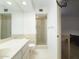 Clean bathroom featuring a vanity with double sinks and a walk-in shower at 7816 N 47Th St, Paradise Valley, AZ 85253