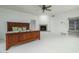Spacious bedroom featuring a fireplace, ceiling fan, and a comfortable bed at 7816 N 47Th St, Paradise Valley, AZ 85253