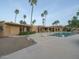 Exterior view showcasing pool, patio, palm trees and desert landscaping, ideal for outdoor entertaining at 7816 N 47Th St, Paradise Valley, AZ 85253